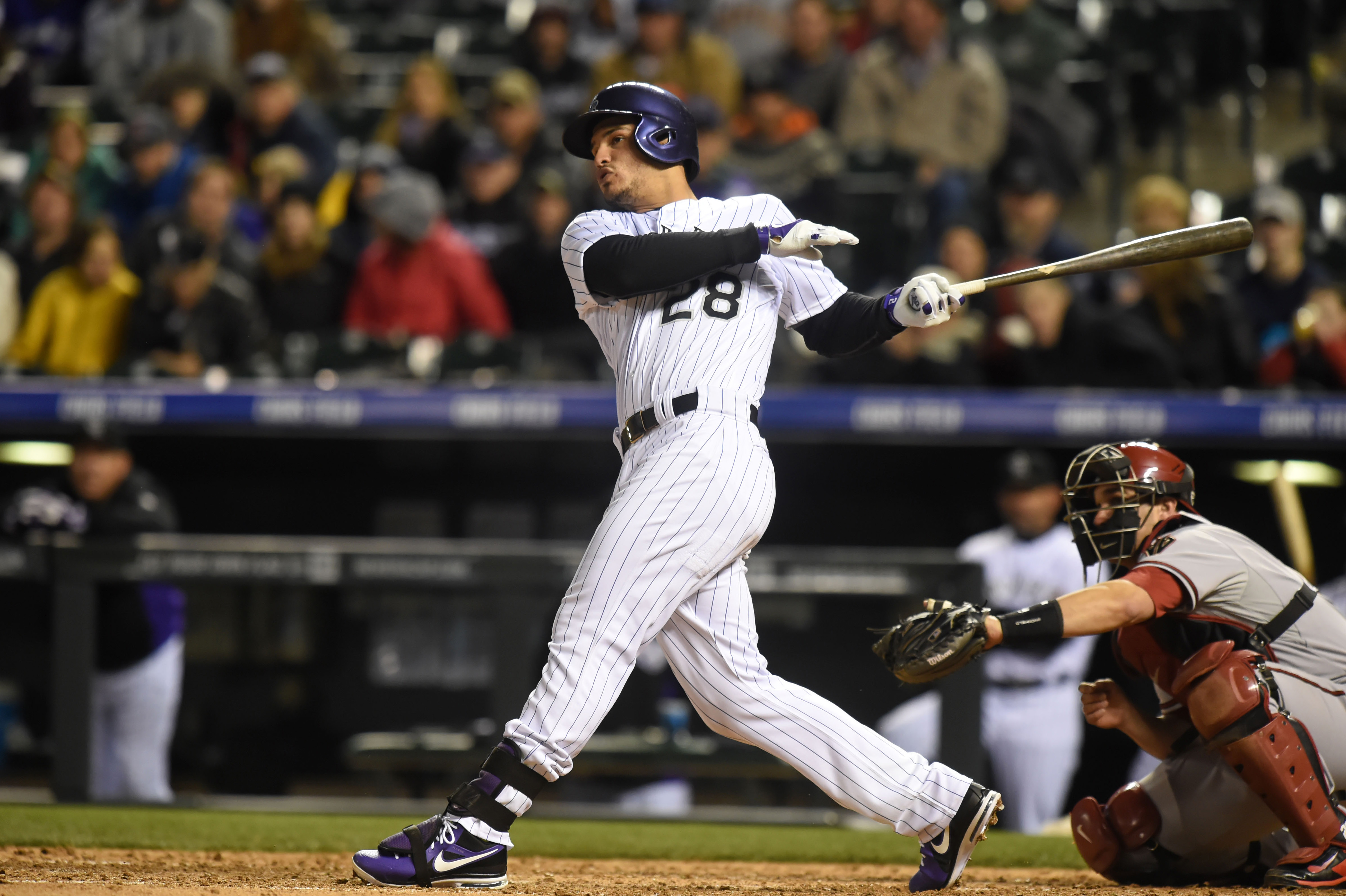 Nolan Arenado's hitting streak over at 28 games, Rockies fall to