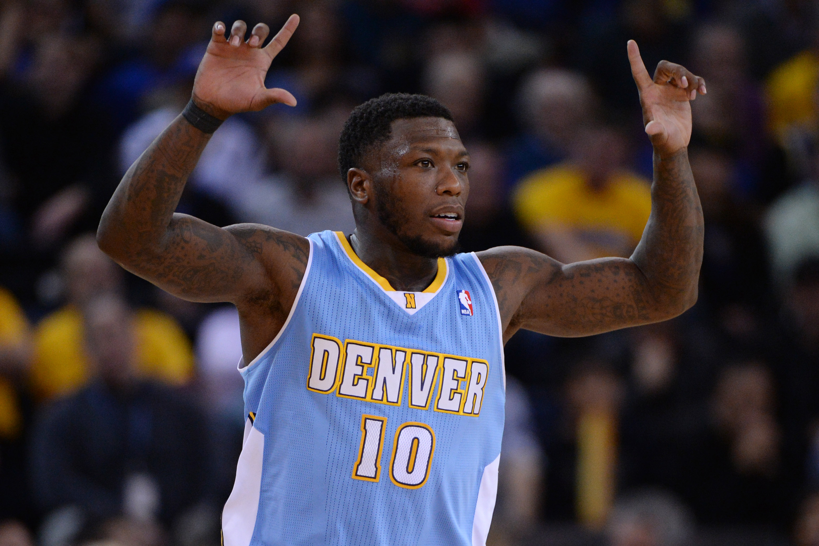 Nuggets' Nate Robinson, Darrell Arthur opt in for next season 