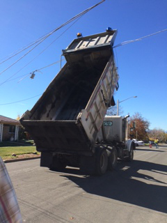 Public works truck knocks down power lines in Denver | 9news.com