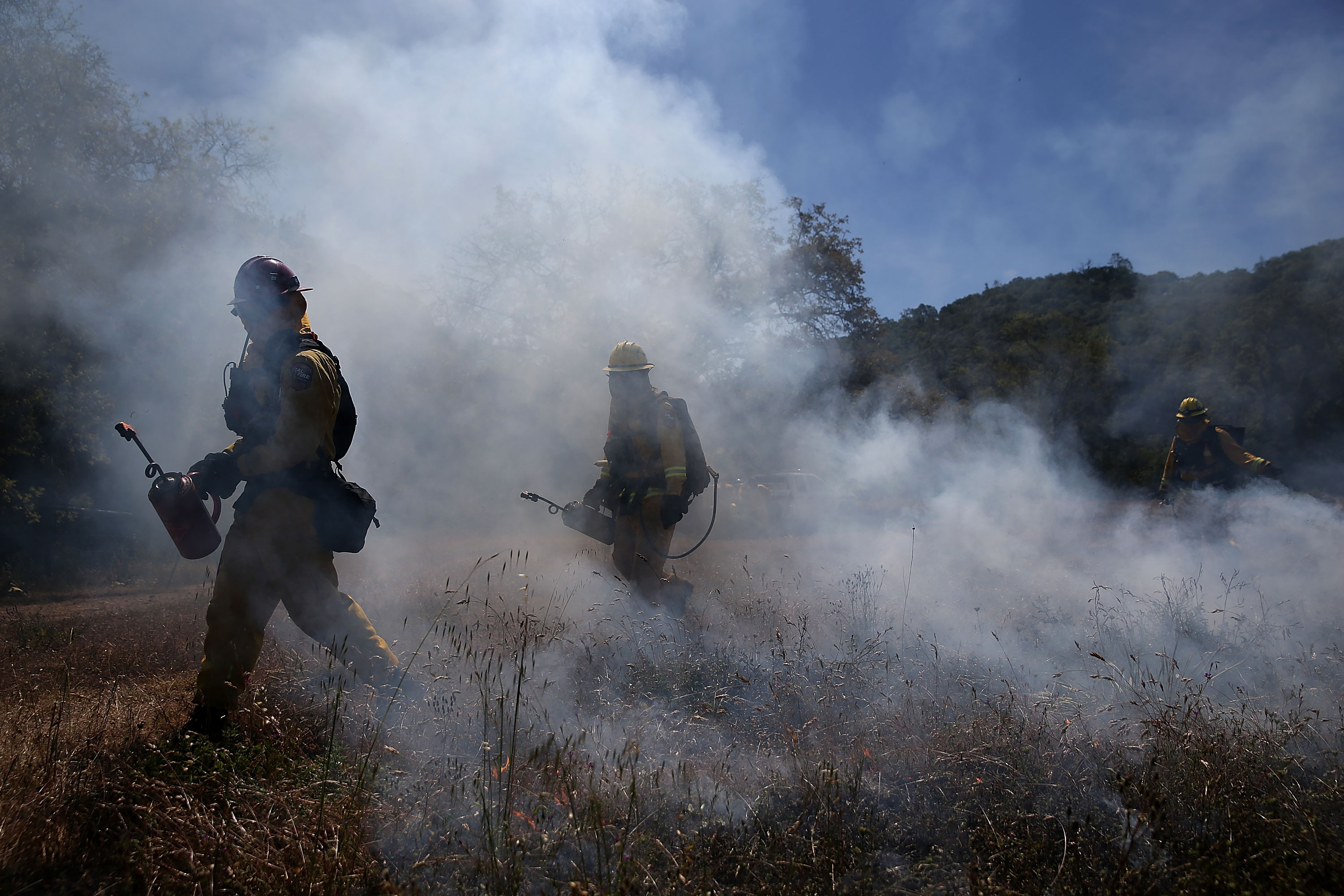 Colorado firefighters battle wildfires across county | 9news.com