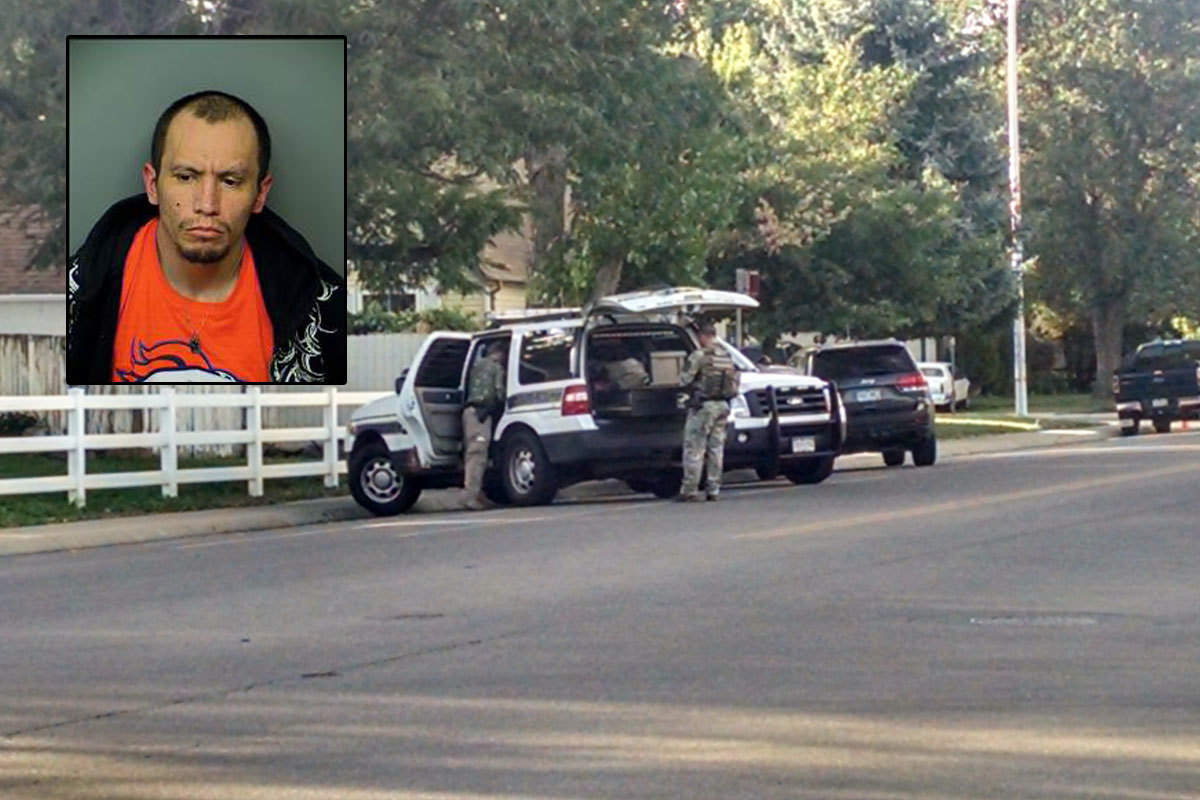 PD: Man who pointed gun at officer captured in garage | 9news.com