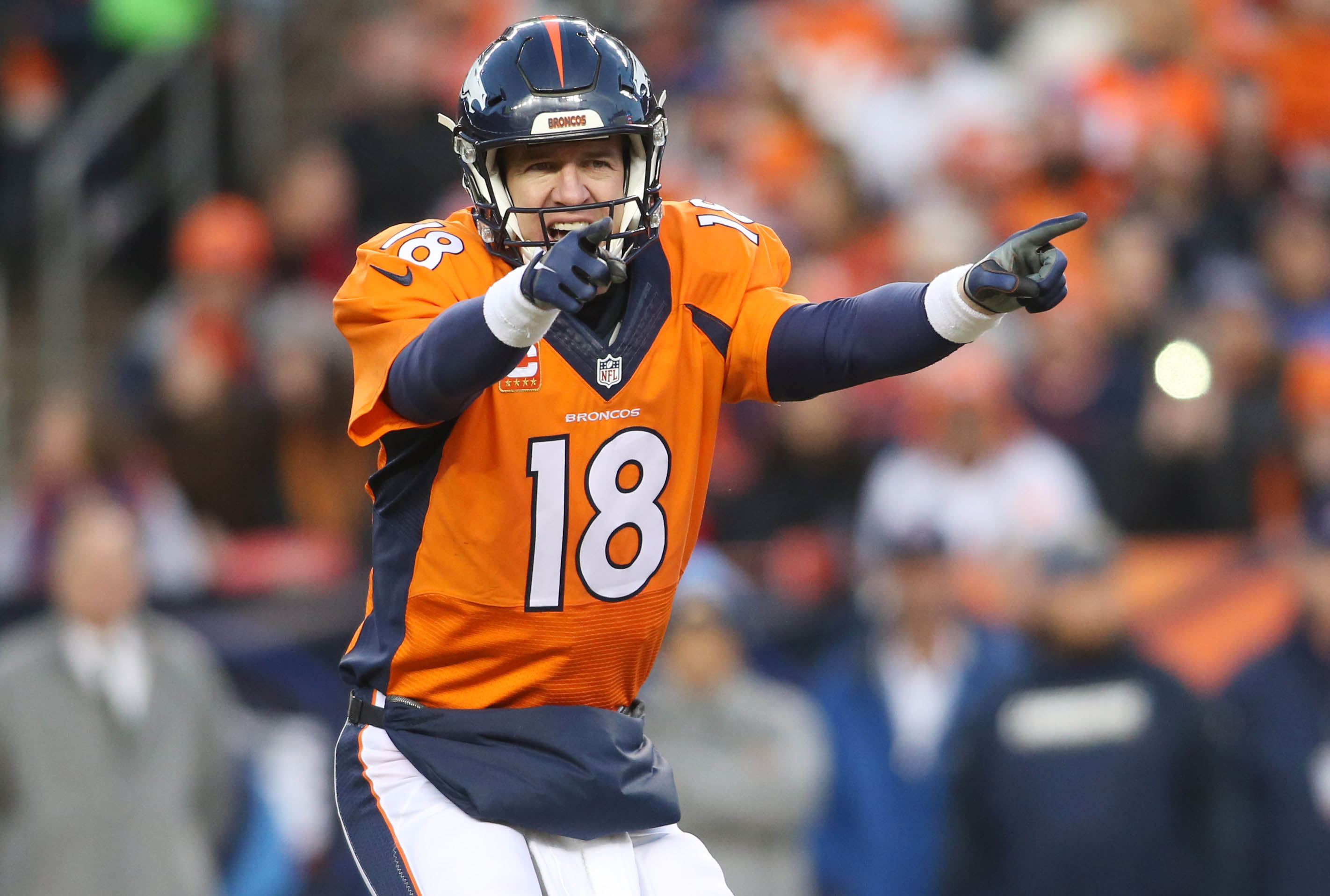 Quarterback Peyton Manning (18) congratulates Demaryius Thomas (88