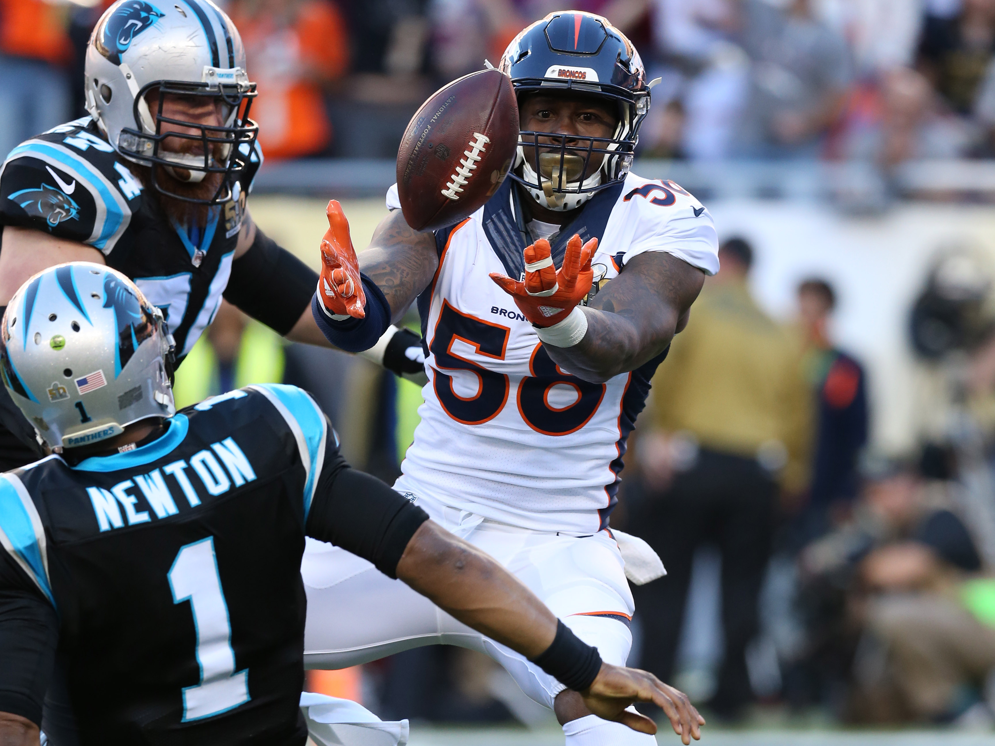 Denver Broncos wide receiver Demaryius Thomas (88) and running back C.J.  Anderson (22) celebrate after Thomas made a touchdown catch in the first  half of an NFL football game against the Pittsburgh