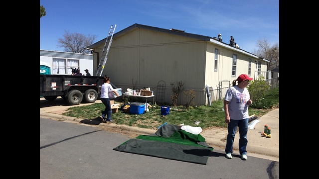 Volunteers help to restore widow's home