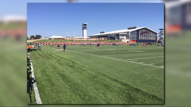 Broncos draw light crowd to camp opener