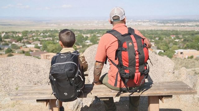 Father, son trying to climb high peaks