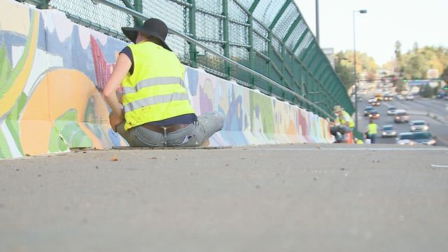 Mural covers Evans Avenue Bridge