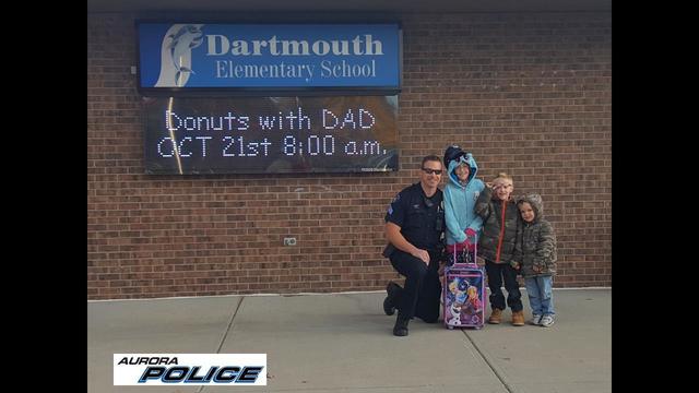 Officer stands in for dad at donut day