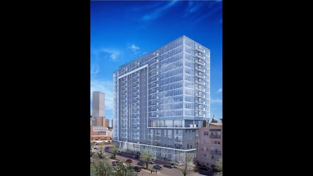 New 18-story apartment building tops out