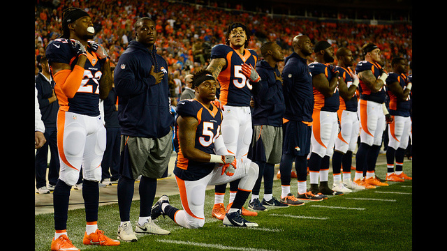 Marshall will stand for national anthem