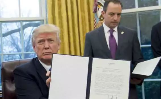 Trump wields his presidential pen