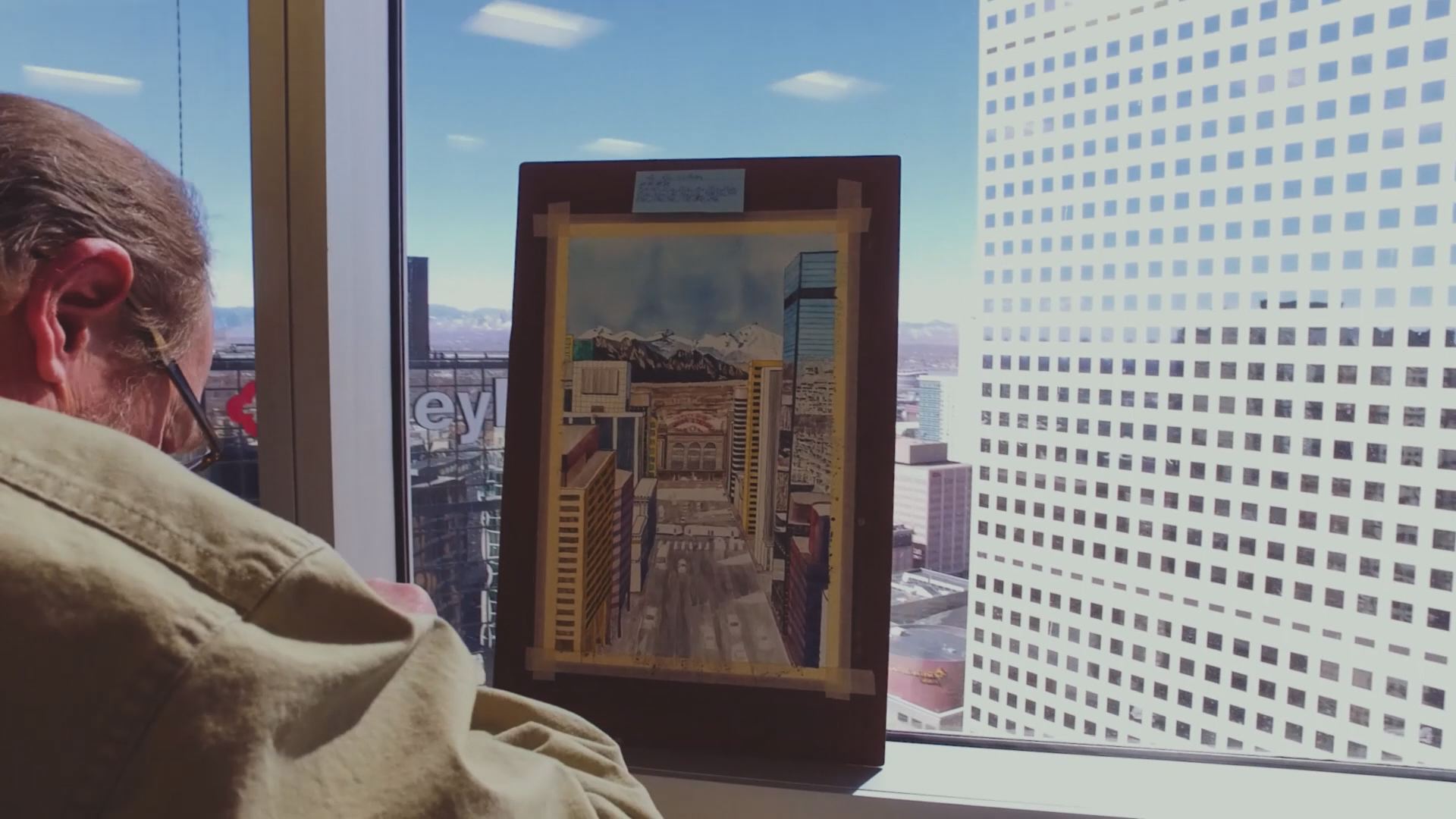 Man turns Denver skylines into paintings