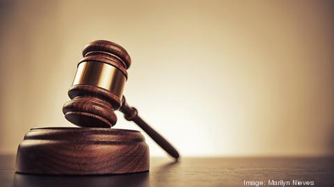 Court: Woman let children burn to death