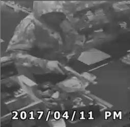 Suspect robs liquor store at gunpoint, takes off on foot | 9news.com