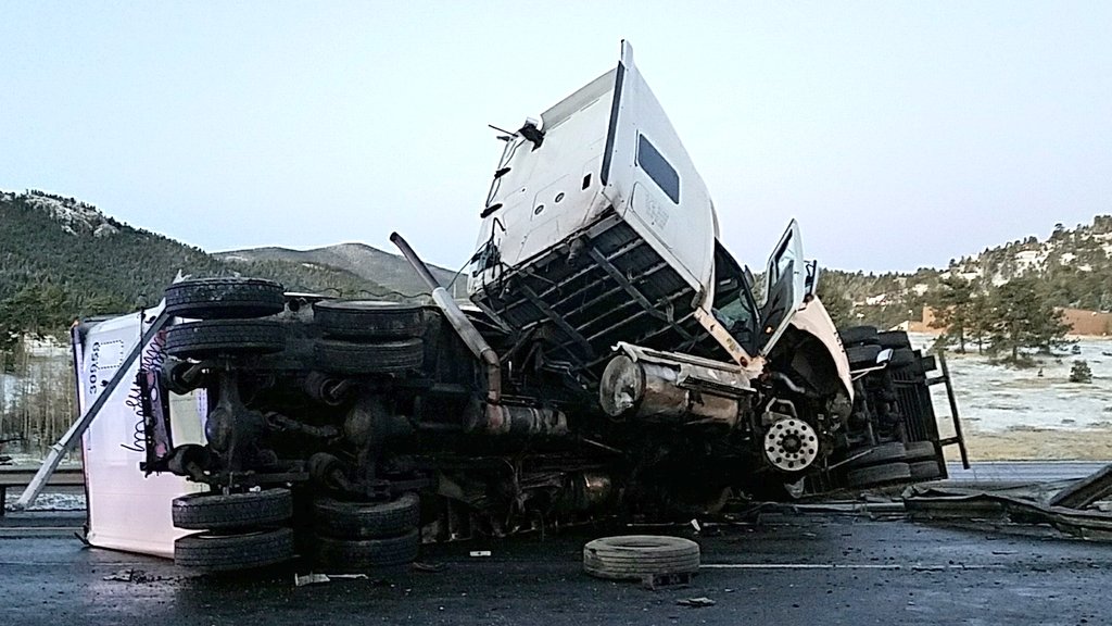 Semi driver seriously injured in rollover crash on I-70 | 9news.com