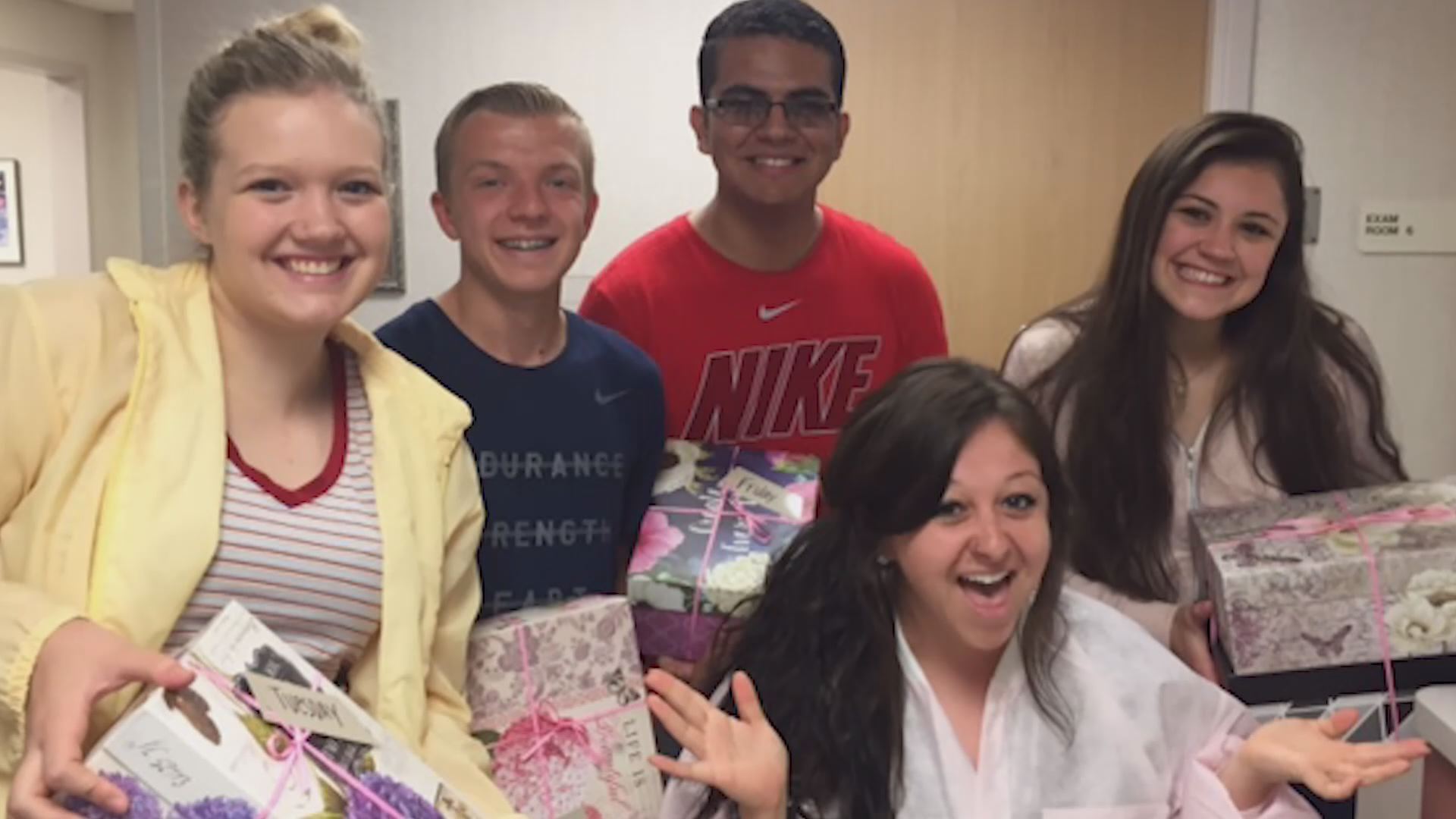 High school students help nurses