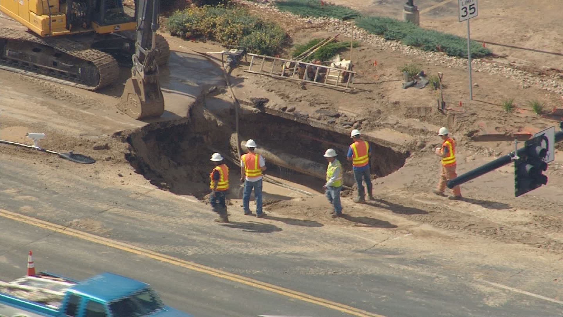 Crews making final repairs to major intersection after water main break ...