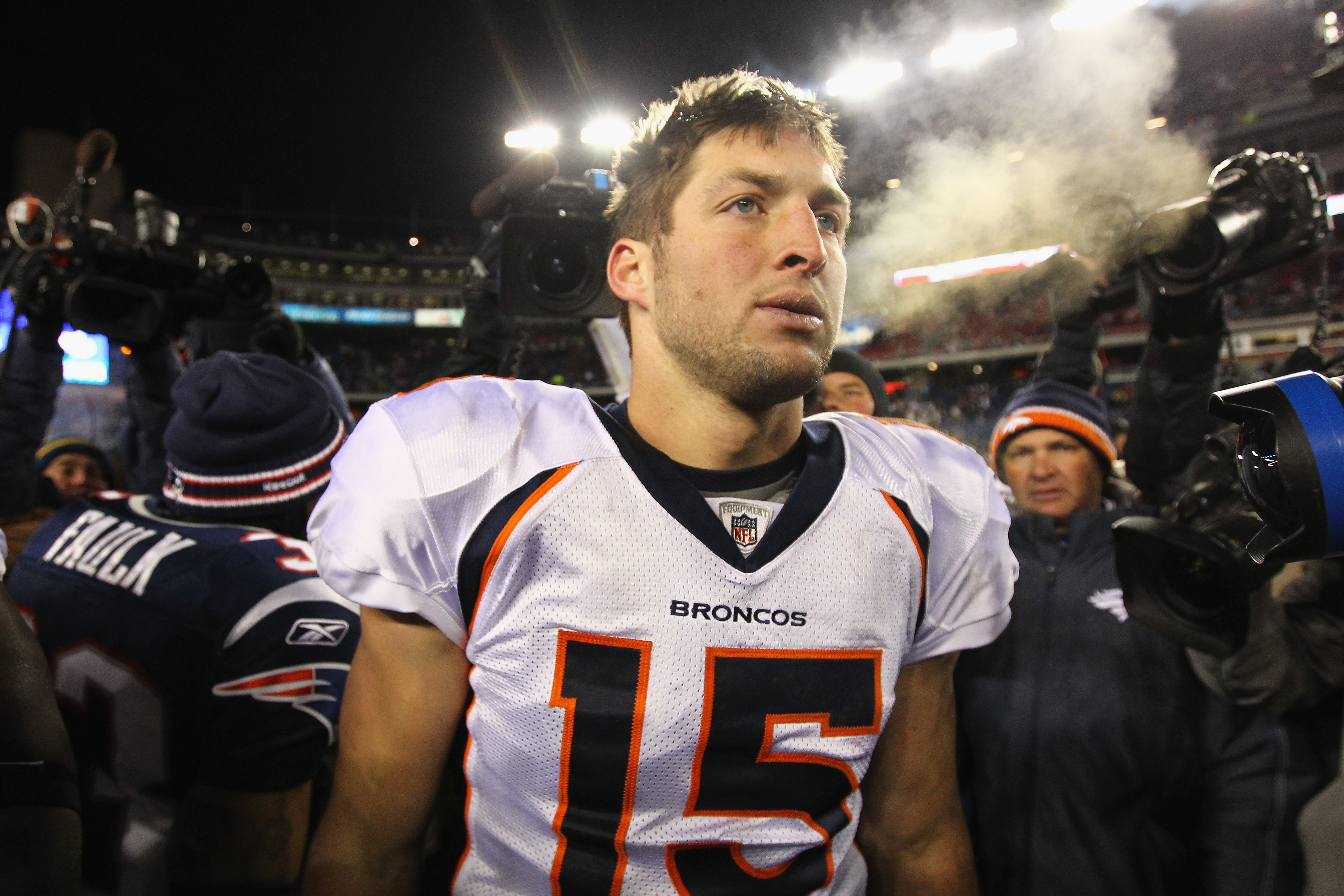 Quarterback Tim Tebow #15 of the Florida Gators rolls out against