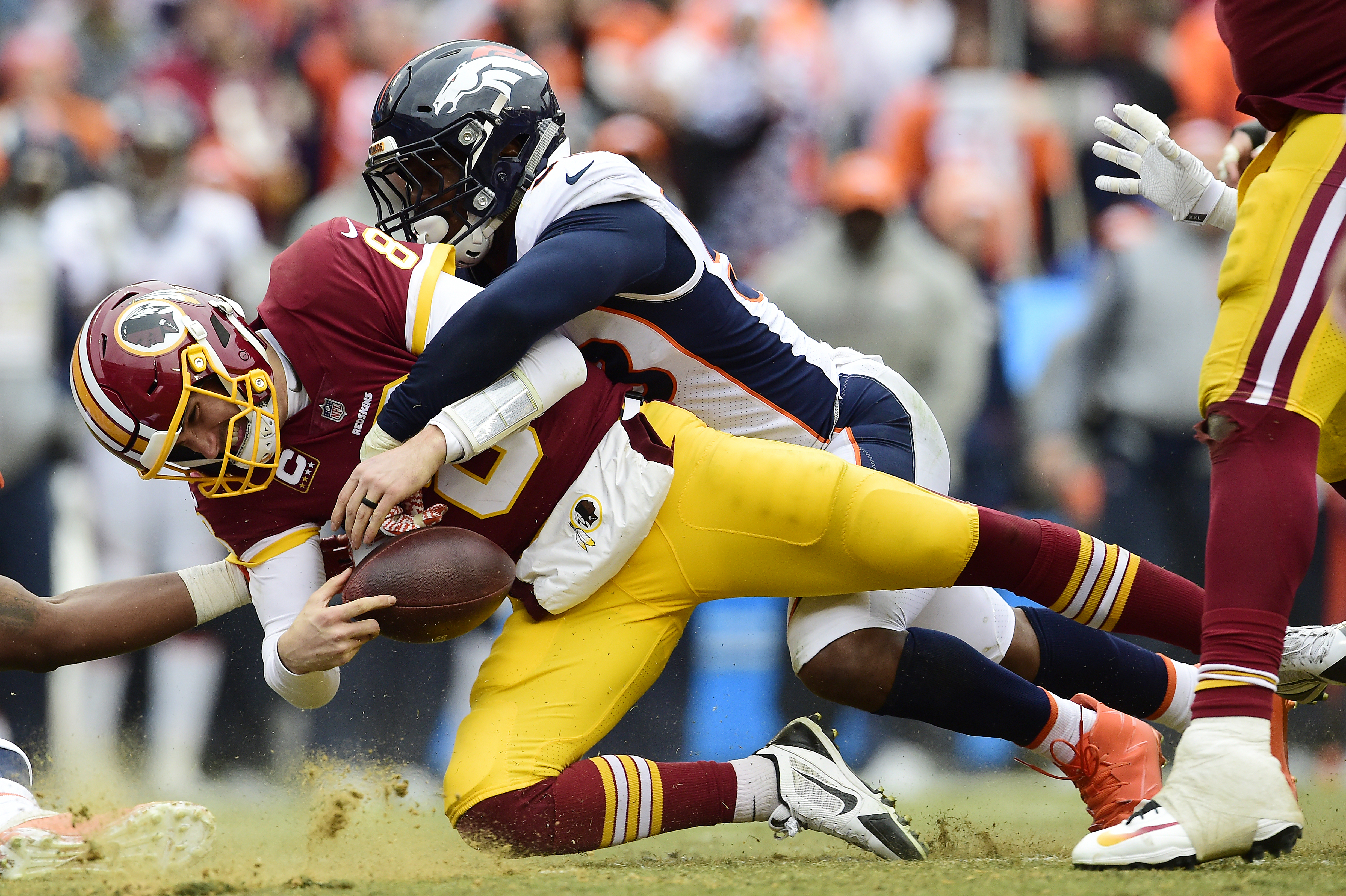 Punter Brett Kern of the Denver Broncos punts against the New York News  Photo - Getty Images