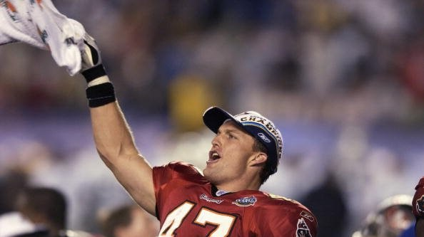 Jan 26, 2003 - San Diego, California, USA - WARREN SAPP of the Tampa Bay  Buccaneers gets up close and personal with teammate JOHN LYNCH prior to  Super Bowl XXXVII between the