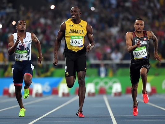 Usain Bolt streaks to third consecutive Olympic gold in 100 meters ...